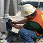 Men Fixing Electric Pole